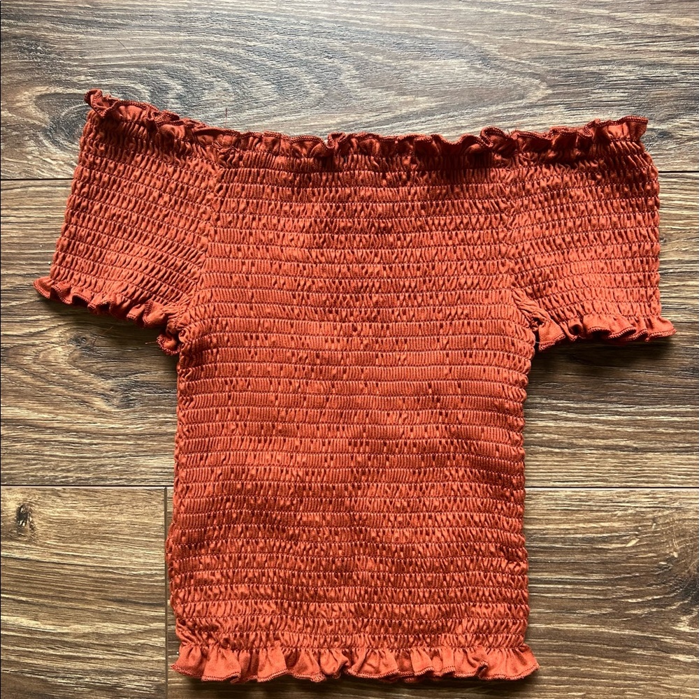 Orange kiss off the shoulder button up tube top.